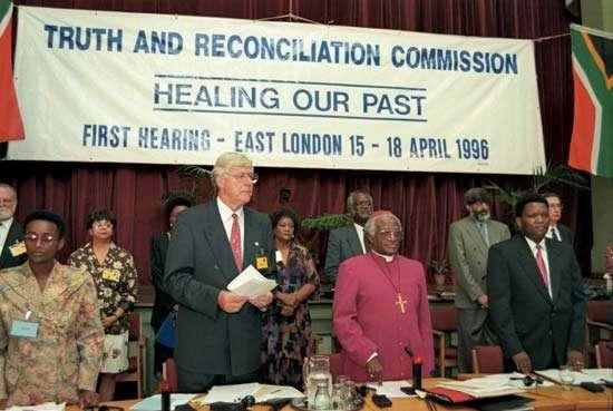 Members of the TRC, including Dr Alex Boraine, Archbishop Desmond Tutu and Rev Bongani Finca at the commission's first hearing, April 1996, East London
